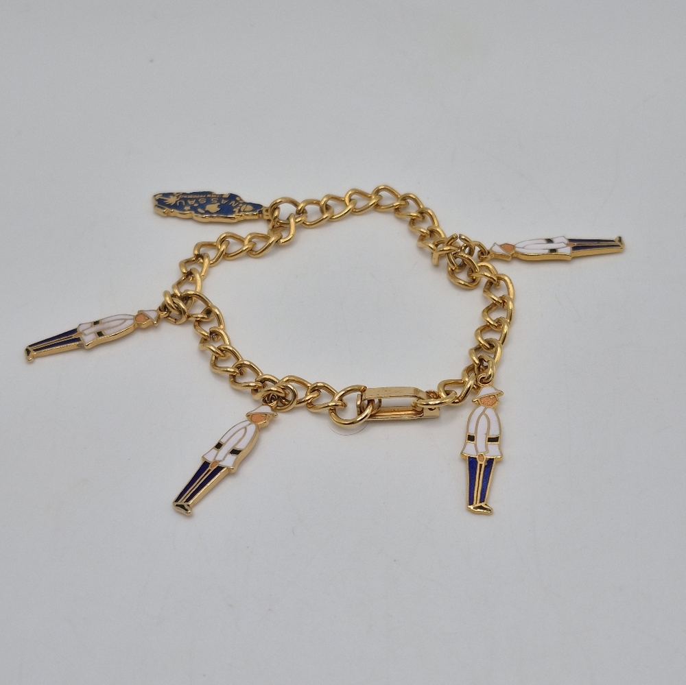 Gold Tone Charm Bracelet with Figurine Charms Representing BAHAMAS.  6 In